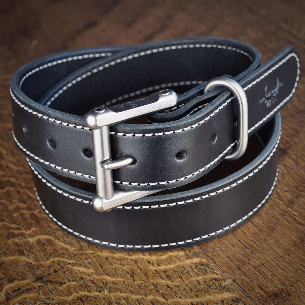 The classic belt, black leather, white stitching and a stainless steel buckle